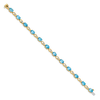 14K Two-tone Gold with rhodium over 14k yellow gold Blue Topaz and
Diamond Bracelet