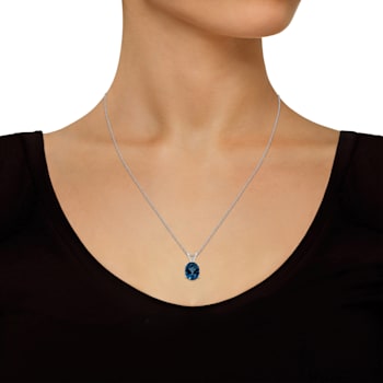 10x8mm Oval London Blue Topaz Rhodium Over Sterling Silver Pendant With Chain