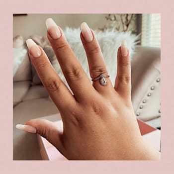 Pear Shape and Round White Topaz 14K Rose Gold Over Sterling Silver
Ring, 1.6ctw
