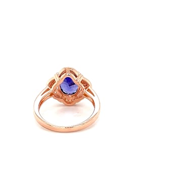 Tanzanite 10x8mm Oval and White Zircon Rhodium Over Sterling Silver Ring