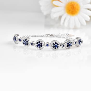 Lab Created Blue Sapphire and White Sapphire Halo Rhodium Over Sterling
Silver Sapphire Bracelet