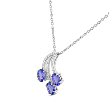 Rhodium Over Sterling Silver 7x5mm Oval Tanzanite and White Cubic
Zirconia Pendant 2.37ctw