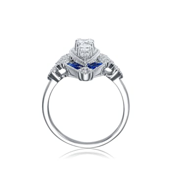 Rhodium Plated over Sterling Silver with Blue Color Cubic Zirconia
Modern Ring