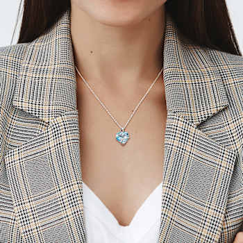 9ctw Sky Blue Topaz and Diamond Accent Heart Wrapped Pendant with Chain
in Sterling Silver