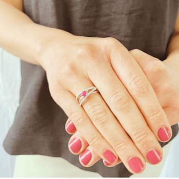 Round Ruby with White Sapphire Accents Sterling Silver Crossover Open
Design Ring, 0.65ctw