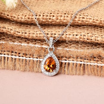 Yellow Pear Shape Citrine Pendant with Moissanite Accents Rhodium Over
Sterling Silver Necklace
