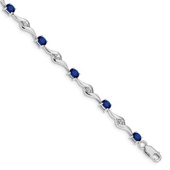 Rhodium Over 10k White Gold Oval Shaped Blue and Round Shaped White
Sapphire Bracelet