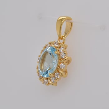 Oval Sky Blue Topaz 2.11ctw and Cubic Zirconia 14K Yellow Gold Over
Sterling Silver Pendant