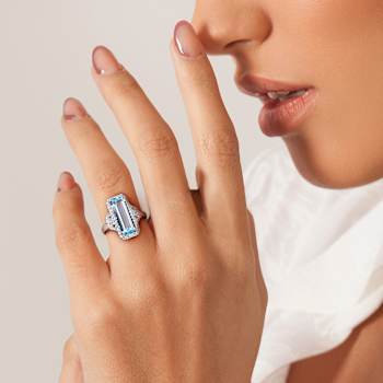 4.25ctw Sky Blue and White Topaz Halo Ring in Sterling Silver