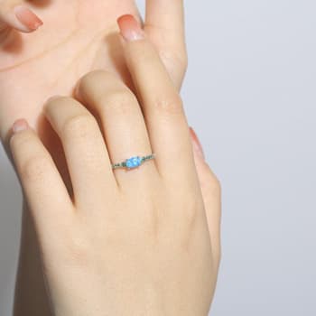 Lab Created Blue Opal with Green Nanocrystal Accents Rhodium Over
Sterling Silver Ring