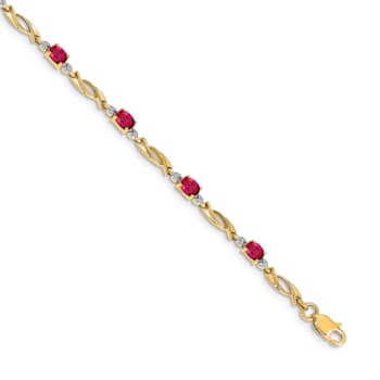 14k Yellow Gold and Rhodium Over 14k Yellow Gold Diamond and Oval Ruby Bracelet