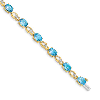 14K Two-tone Gold with rhodium over 14k yellow gold Blue Topaz and
Diamond Bracelet