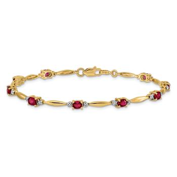 10k Yellow Gold and Rhodium Over 10k Yellow Gold Diamond and Oval Ruby Bracelet