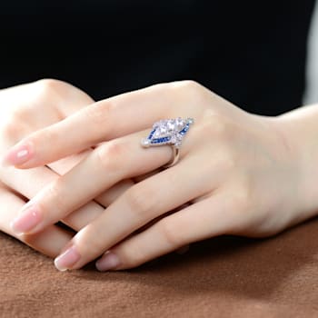 Rhodium Plated over Sterling Silver with Blue Color Cubic Zirconia
Modern Ring