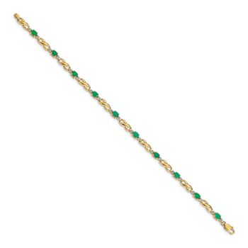 10k Yellow Gold and Rhodium Over 10k Yellow Gold Diamond and Oval
Emerald Bracelet