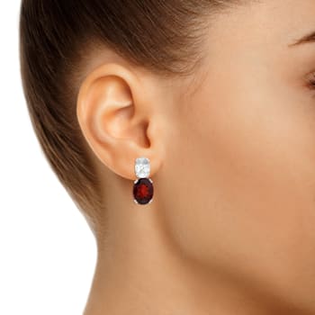 9x7mm Oval Garnet And White Topaz Rhodium Over Sterling Silver Earrings