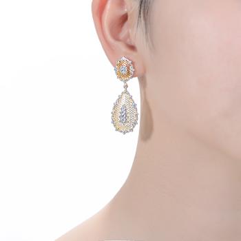 Pear Shape CZ Two-Tone Drop Earrings In 14K Gold Over Brass And Rhodium
Over Brass