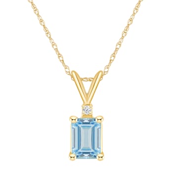 7x5mm Emerald Cut Aquamarine with Diamond Accent 14k Yellow Gold Pendant
With Chain