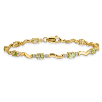 14k Yellow Gold and Rhodium Over 14k Yellow Gold Fancy Diamond and
Peridot Bracelet