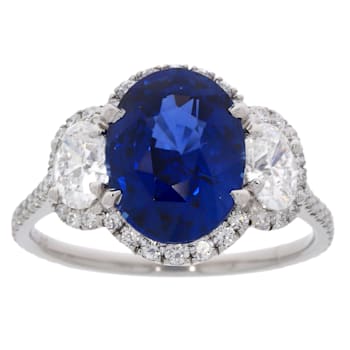 Oval Blue Sapphire and White Diamond Platinum Ring. 4.80 CTW