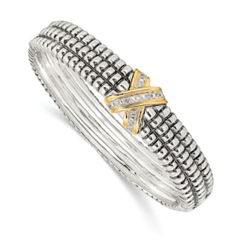 Sterling Silver with 14K Gold Over Sterling Silver Oxidized 1/15ct.
Diamond Bangle Bracelet
