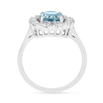 Blue Topaz with Moissanite Accents Sterling Silver Halo Ring