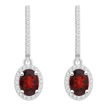 7x5mm Oval Garnet 1/3 ctw Diamond Rhodium Over Sterling Silver Halo
Dangle Earrings