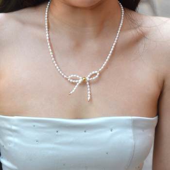 Cultured Freshwater Pearl Bow Necklace with Gold-Tone Brass Accents