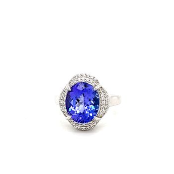 Tanzanite 12x10mm Oval and White Zircon Rhodium Over Sterling Silver Ring