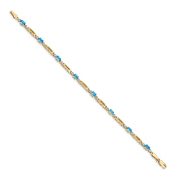 10k Yellow Gold and Rhodium Over 10k Yellow Gold Diamond and Blue Topaz Bracelet