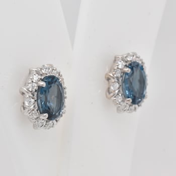 1.74ctw Oval London Blue Topaz and Cubic Zirconia Rhodium Over Sterling
Silver Earrings