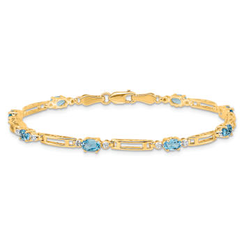 10k Yellow Gold and Rhodium Over 10k Yellow Gold Diamond and Blue Topaz Bracelet