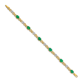 14k Yellow Gold and Rhodium Over 14k Yellow Gold Diamond and Emerald
Infinity Bracelet