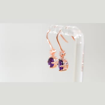 Amethyst and CZ 1.59 Ctw Round 18K Rose Gold Over Sterling Silver Drop
Earrings Jewelry.