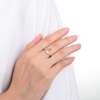 Peach Orange Lab Created Pear Shaped Padparadscha Sapphire &
Moissanite Rhodium Over Silver Ring