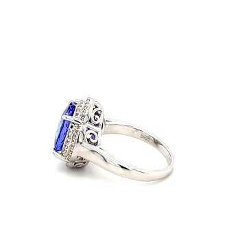 Tanzanite 12x10mm Oval and White Zircon Rhodium Over Sterling Silver Ring
