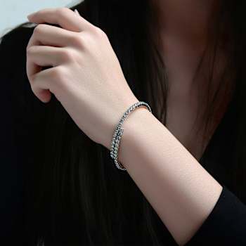 Bypass CZ Tennis Bracelet In White Rhodium Over Brass