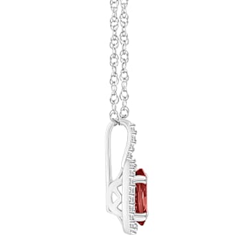 8x6mm Oval Garnet 1/7 ctw Diamond Rhodium Over Sterling Silver Halo
Pendant with Chain