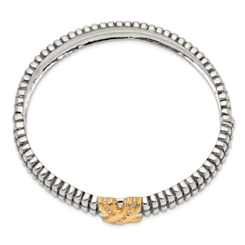 Sterling Silver with 14K Gold Over Sterling Silver Oxidized 1/15ct.
Diamond Bangle Bracelet