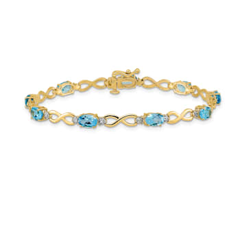 14k Yellow and White Gold with Rhodium Over 14k Yellow Gold Blue Topaz
and Diamond Infinity Bracelet