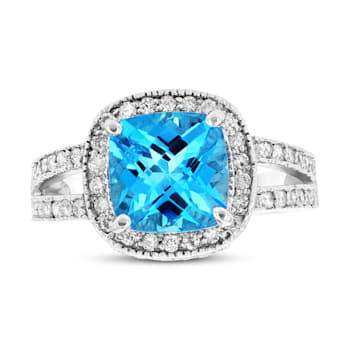 9mm Cushion Blue Topaz with Diamond Accents 14k White Gold Halo Split
Shank Ring 0.50ctw