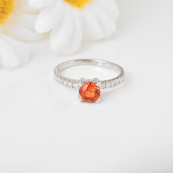 Peach Orange Lab Created Padparadscha Sapphire Round Rhodium Over
Sterling Silver Solitaire Ring