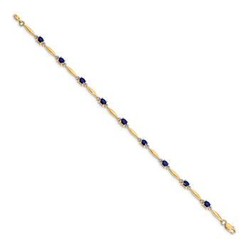 10k Yellow Gold and Rhodium Over 10k Yellow Gold Diamond and Oval
Sapphire Bracelet