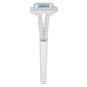 6x4mm Oval Aquamarine 1/4 ctw Diamond Rhodium Over Sterling Silver Halo Ring