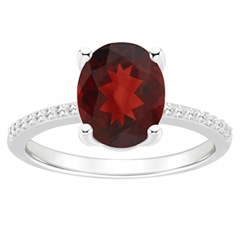 10x8mm Oval Garnet and 1/10 ctw Diamond Rhodium Over Sterling Silver Ring