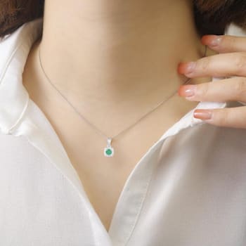 Emerald and Moissanite Sterling Silver Halo Style Pendant With Chain