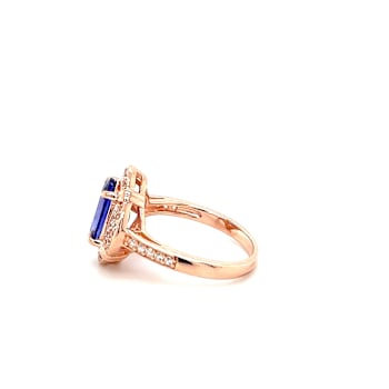 Tanzanite 10x8mm Oval and White Zircon Rhodium Over Sterling Silver Ring