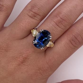 10.45ctw Oval Blue Sapphire and Fancy Yellow Diamond Platinum Ring