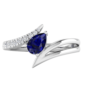 0.74Ct Round White Diamond and Pear Shape Blue Sapphire Bypass
Engagement Ring in 14KT White Gold