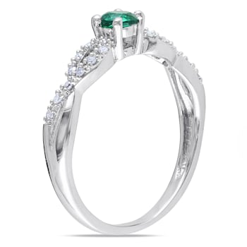 1/10 CT TGW Created Emerald and 1/10 CT TW Diamond Infinity Ring in
Sterling Silver